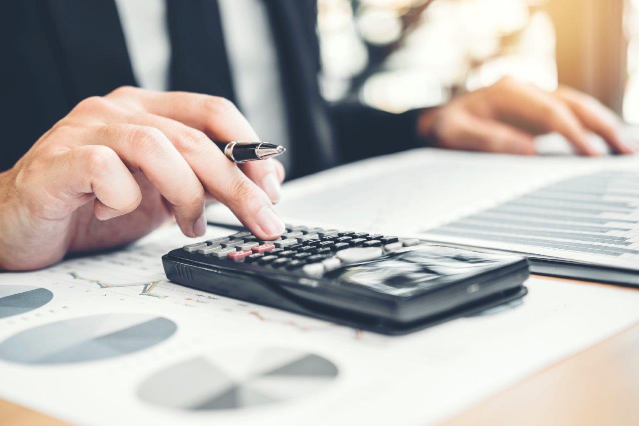 man using calculator