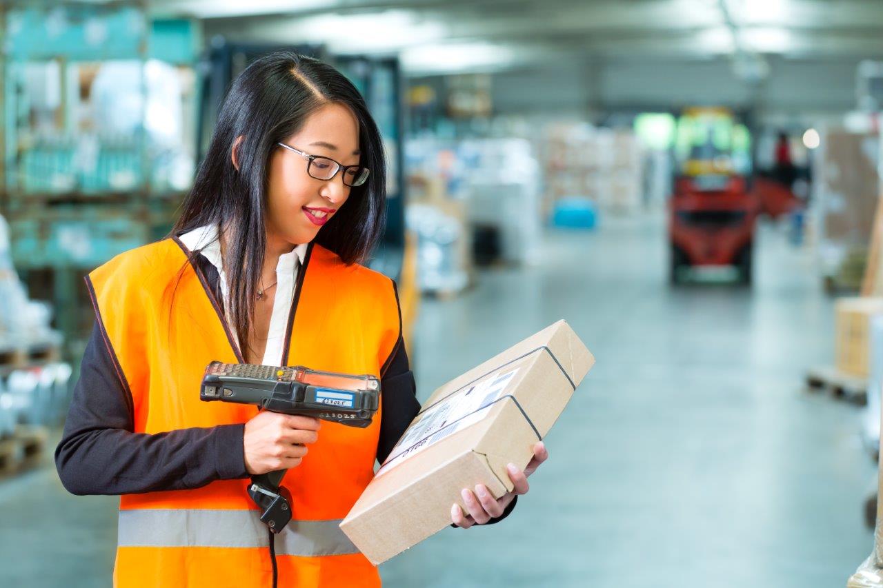 woman scanning package
